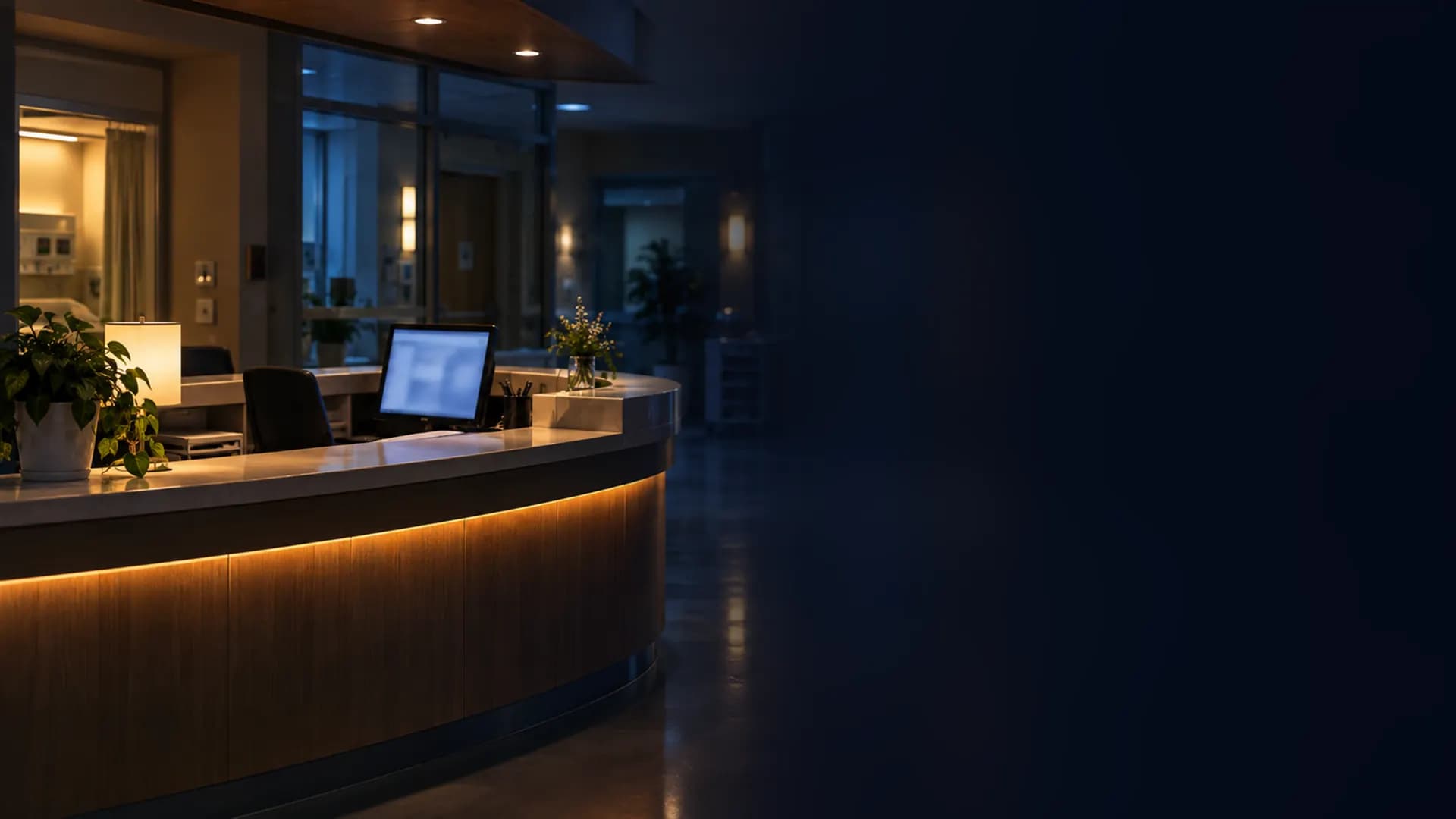 A hospital admissions desk at night